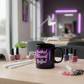 Black mug with 'Booked, Blessed & Buffed' text on a colorful background