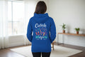 Blue hoodie with 'Cuticle Whispere' text and nail polish graphic on a white background