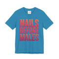 Blue t-shirt with 'Nails Before Males' text on a white background