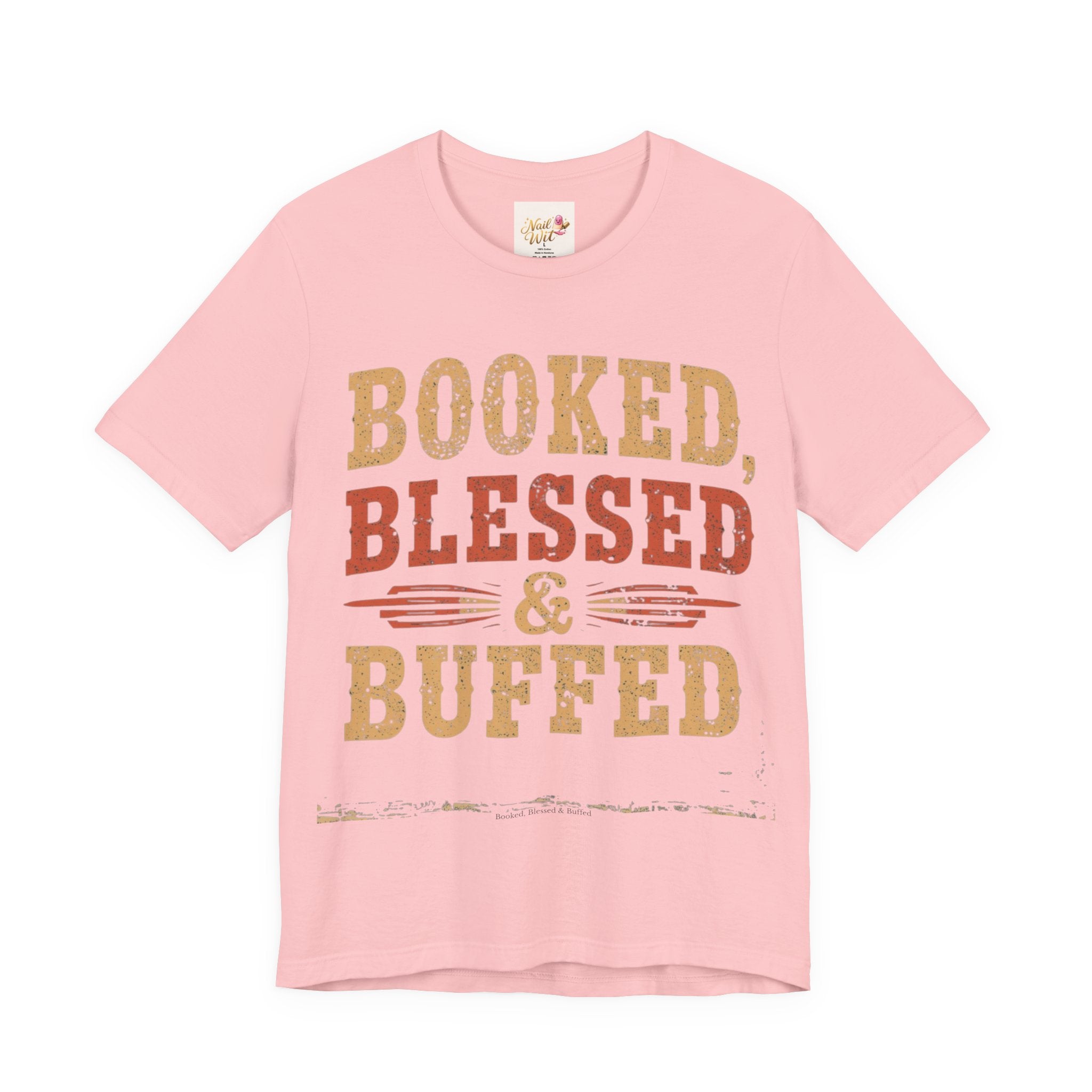 Pink t-shirt with 'Booked, Blessed & Buffed' text on a white background