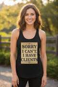 Black tank top with 'Sorry I Can't, I Have Clients' text on a beige background