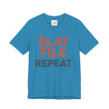 Blue t-shirt with 'Slay File Repeat' text on a white background
