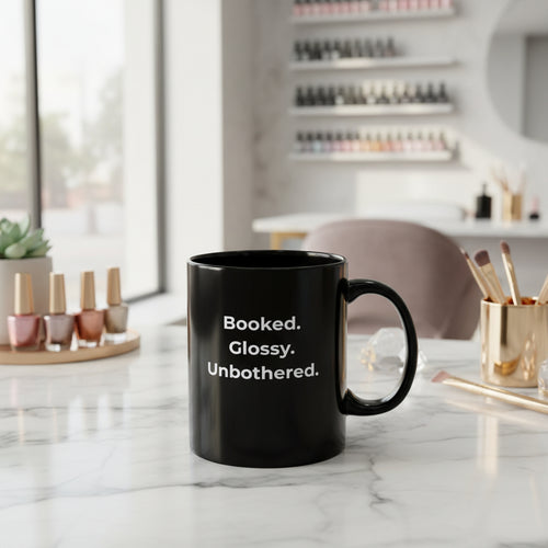 Black mug with white graphic design on a white background