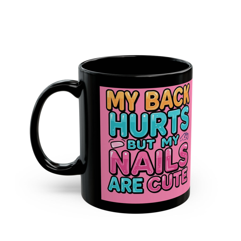 Black mug with colorful text on a pink background