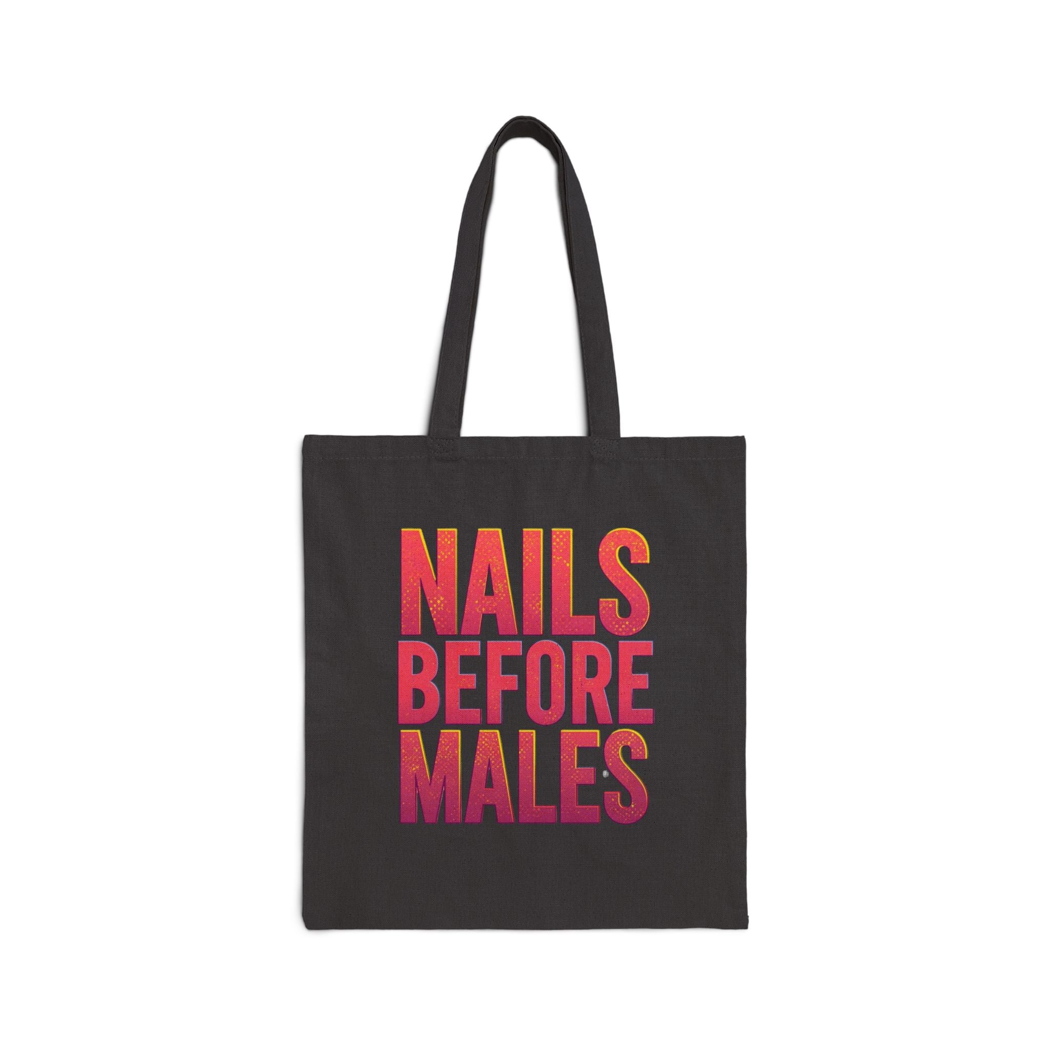 Black tote bag with colorful text 'NAILS BEFORE MALES' on a white background