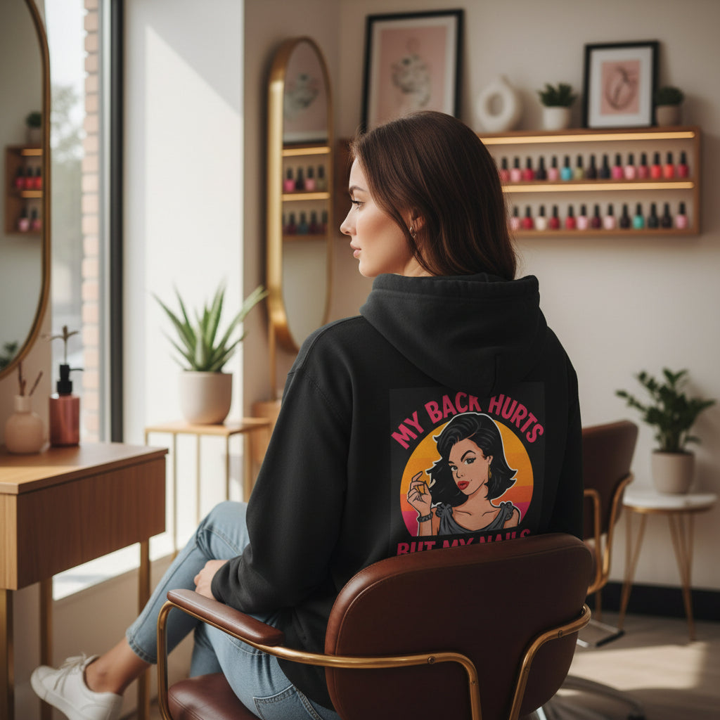 Black hoodie with a graphic design on the back featuring a woman and text.