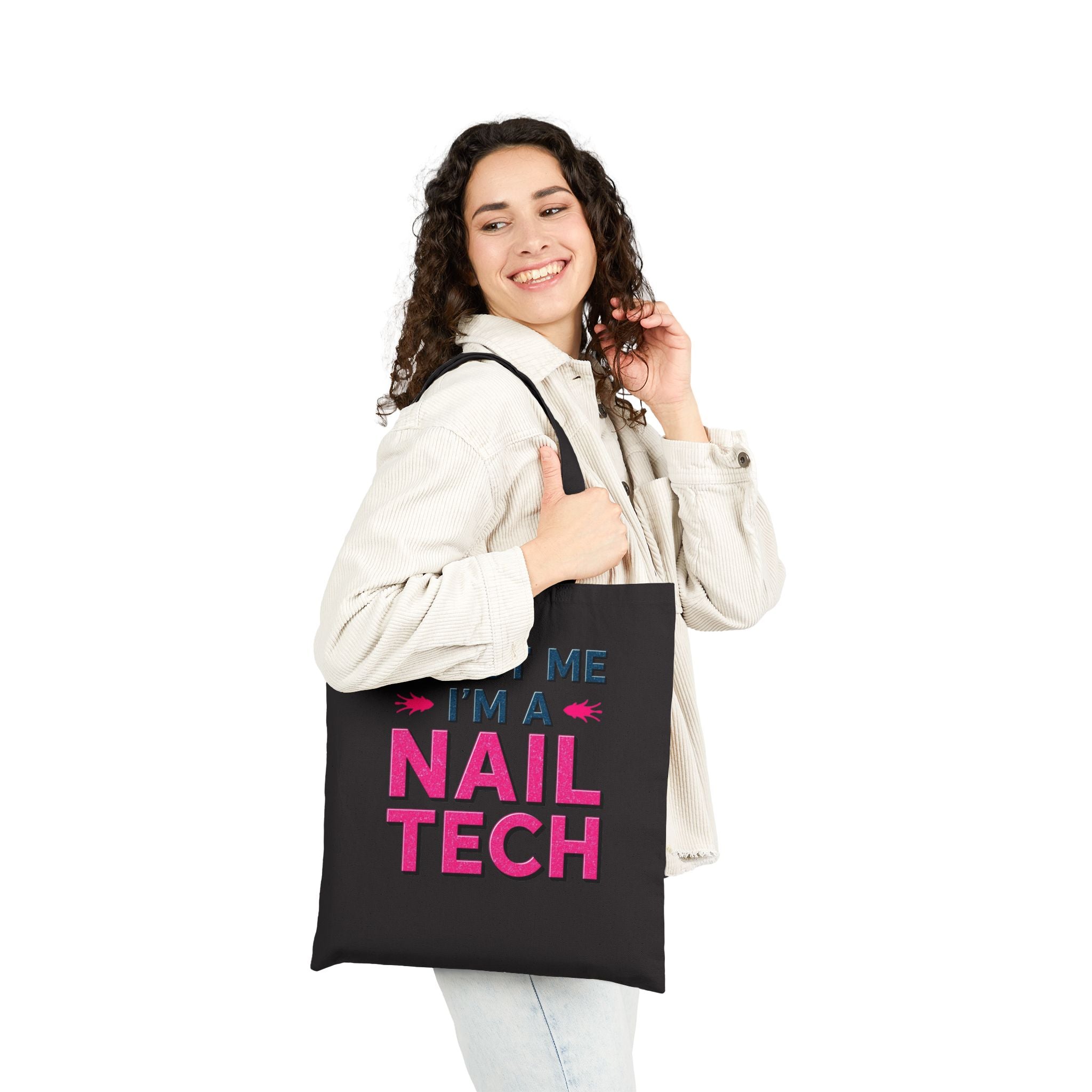 Woman holding a tote bag with 'Nail Tech' text on a white background