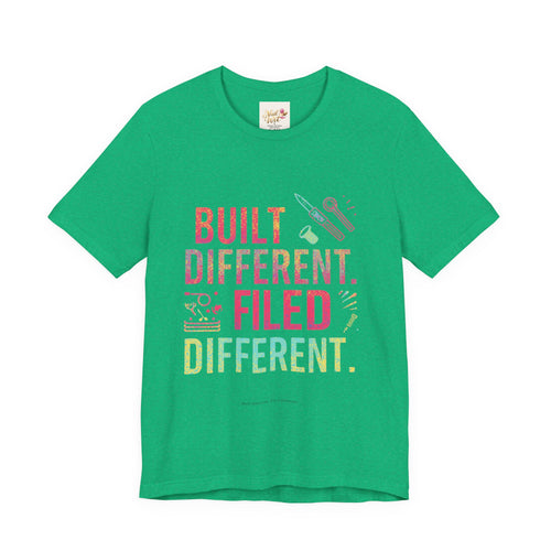 Green t-shirt with colorful text and graphics on a white background