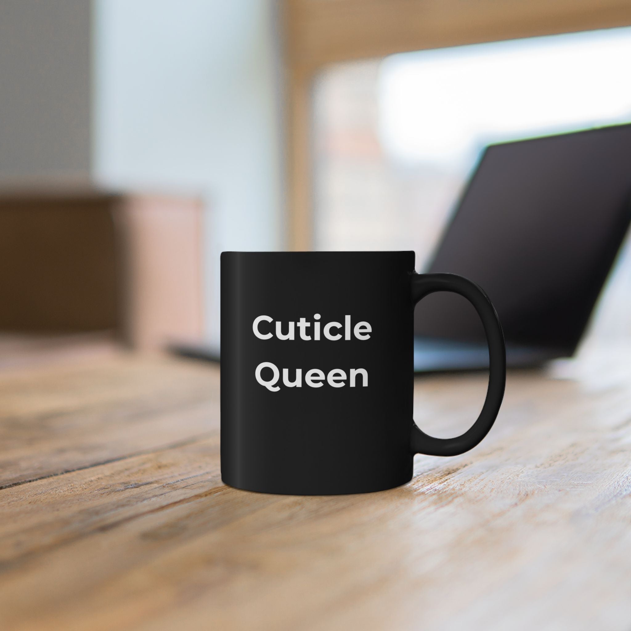 Black mug with 'High Lady of the Night Court' design on a wooden surface.