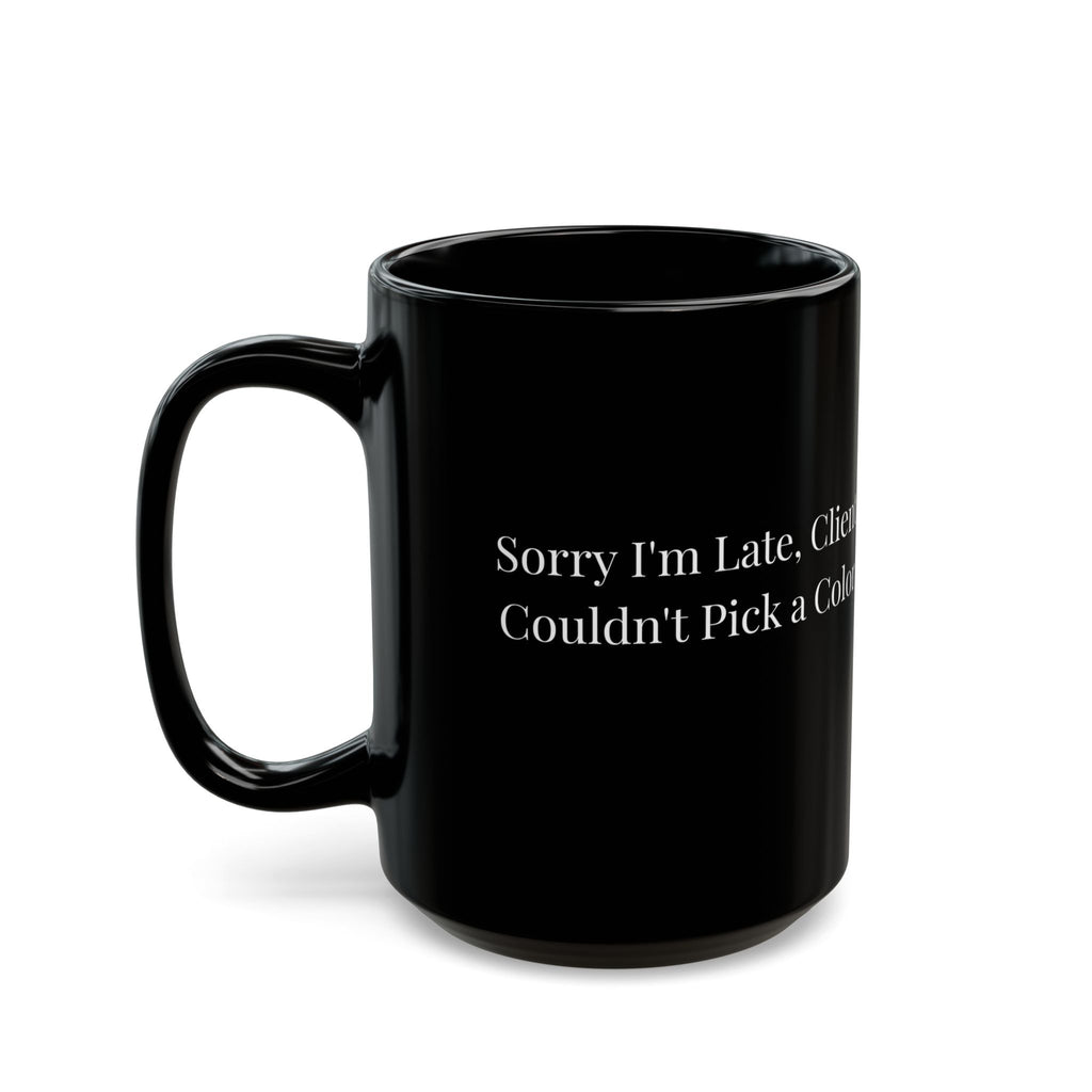 Black mug with 'Well Hung Artwork Placement' logo on a white background