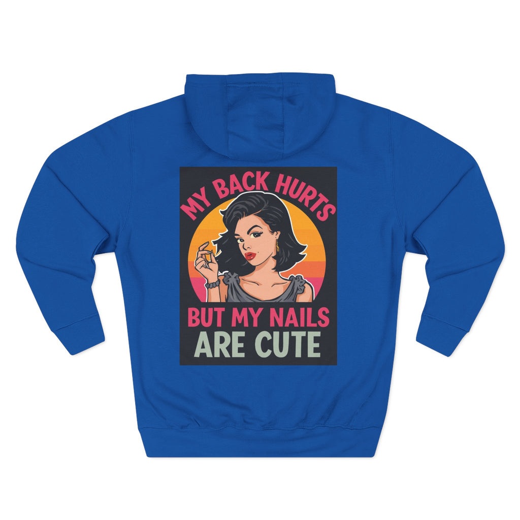 Blue hoodie with graphic design of a woman and text 'My back hurts but my nails are cute' on a white background
